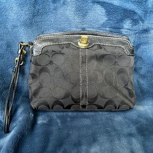 Small black Coach wristlet